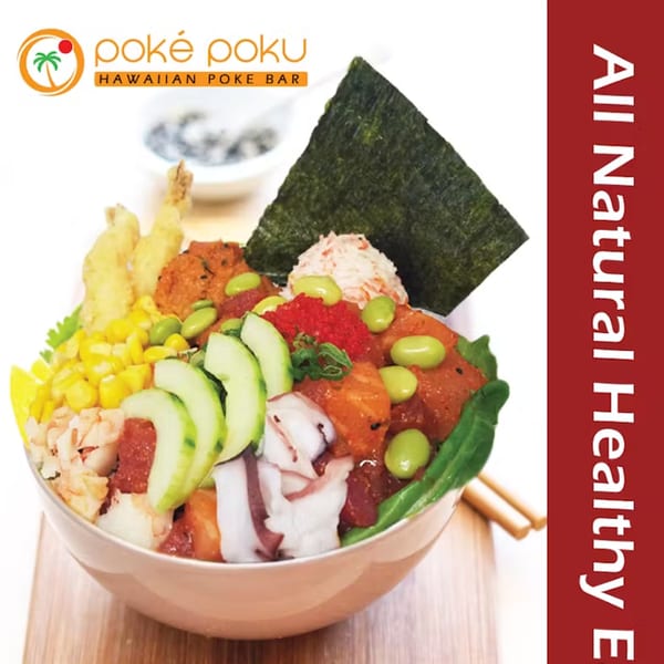 A colorful Poke Poku bowl with tuna, octopus, corn, edamame, cucumber, and tempura shrimp.